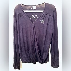 Dallas Cowboys women’s long sleeve v neck shirt. NWT. Size M
